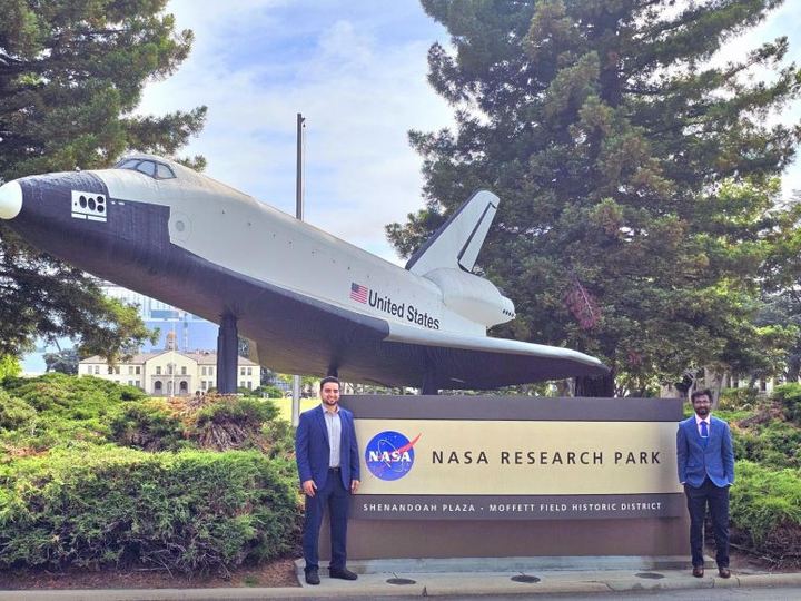 Lab members at the NASA Research Park sign at Ames